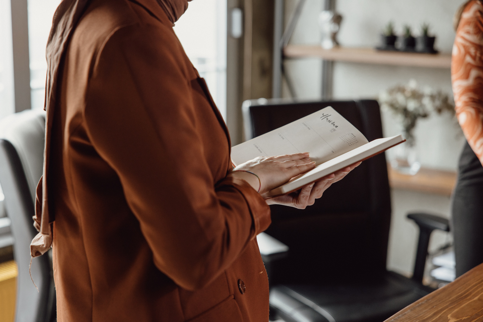 Turkish Woman Holding a Notebook 